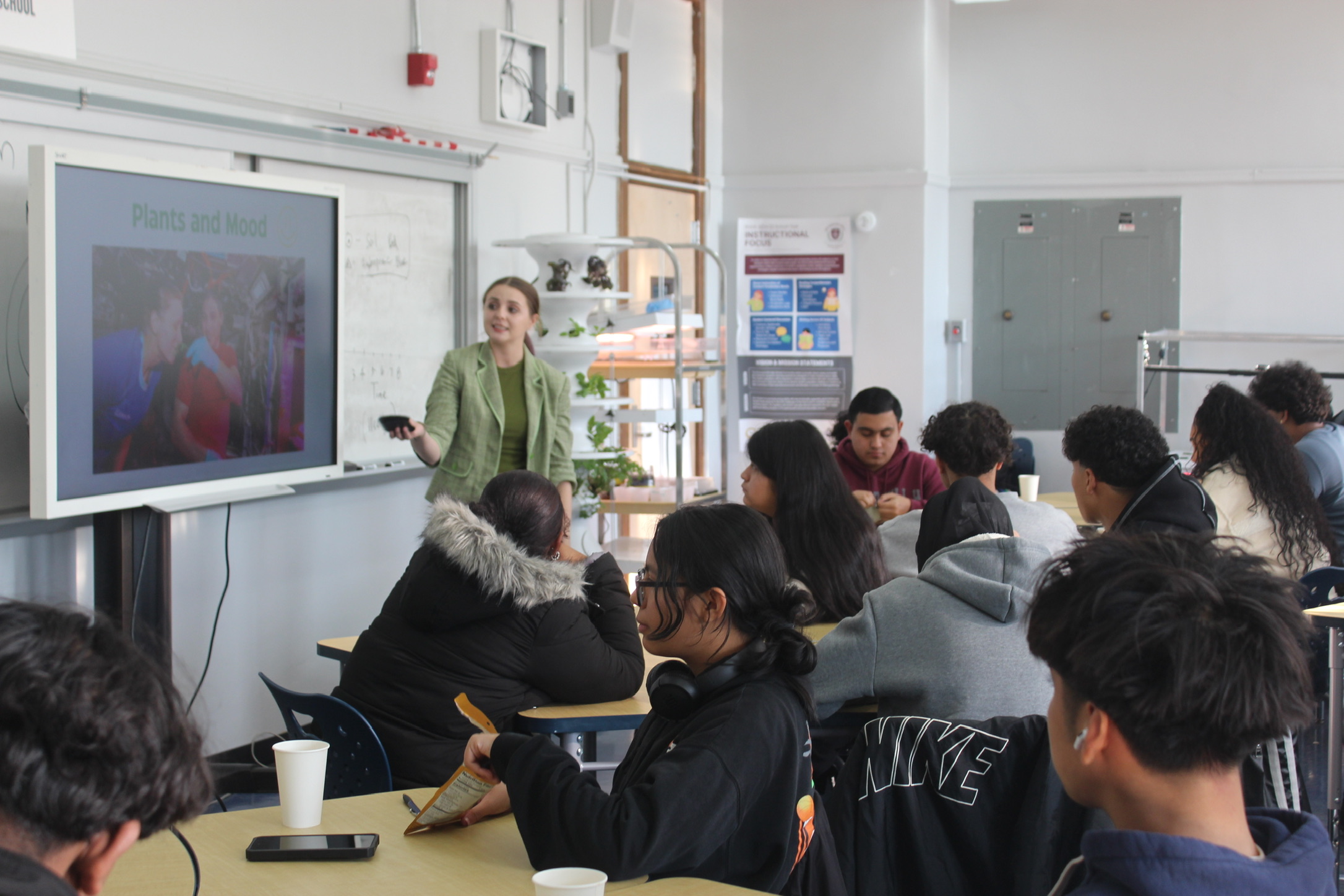 Students at Richmond Hill High School listen to a lecture in astrobotany in their hydroponics classroom.